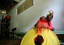 thumb for Cuban dancer waits to go onstage during an event marking World AIDS Day at AIDS sanatorium near Havana
